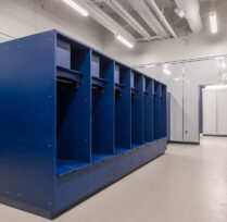 Locker room with blue locker cubicles
