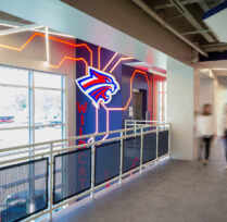 Interior of building with lighted Wildcat design