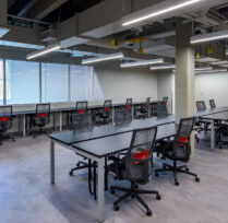 Classroom with long tables and chairs