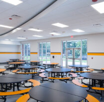 Cafeteria with round tables and benches