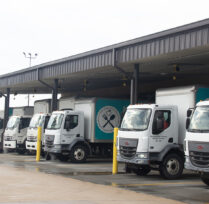 Fleet of trucks parked at a dock
