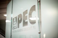 PEC logo on glass