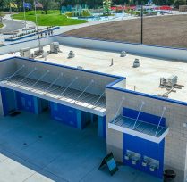 Aerial view of concession stand building with blue awnings
