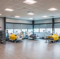 Interior of allied health classroom showing hospital beds and equipment