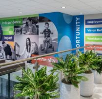 View of interior from second floor showing wall mural