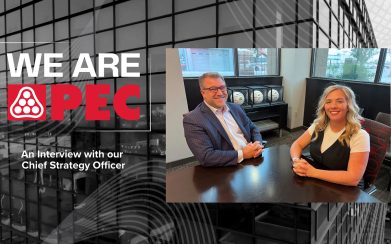 PEC Mike Hughes and Jill sitting at table