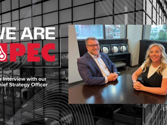 PEC Mike Hughes and Jill sitting at table