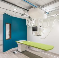 Exam room with table and machine
