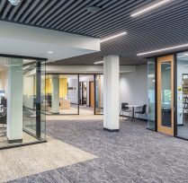 Interior hallway with glass office entryway