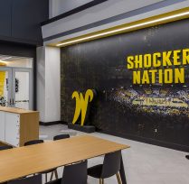 Black wall showing Shocker Nation in yellow
