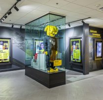 Commemorative wall showing Wu costume in glass case