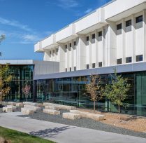 Exterior of building showing wall of glass