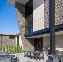 Outdoor area with patio tables and chairs
