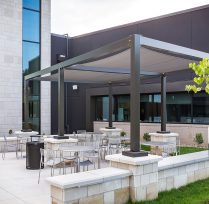 Outdoor awning with tables and chairs
