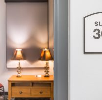 Sleep room sign outside of room