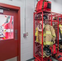 Firefighter locker with fire suit hanging