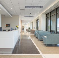 Waiting check-in area with couches