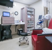 Smaller treatment room with patient chair