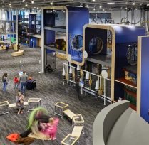 Large play area with blue climbing gym