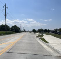 Road with wider lanes and sidewalk