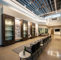 Main hallway with chairs and cabinets