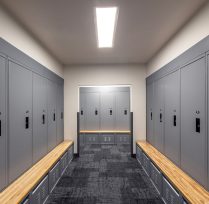 Locker room with grey lockers along the walls