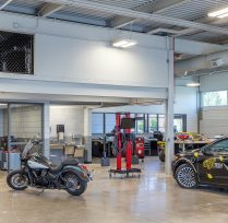 Open area with car and motorcycle