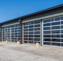 Glass garage doors from the exterior of building