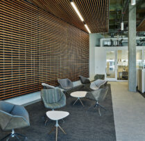 Sitting area with chairs and small coffee tables