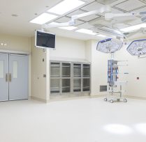 Empty operating room with two large lights