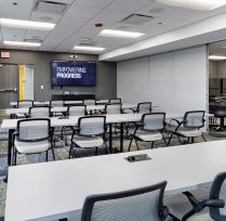 Conference training room with long tables and chairs