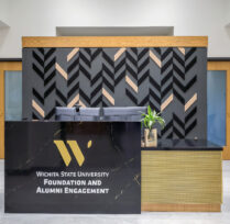 Front reception desk large foundation sign