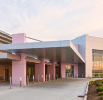 Front entrance with pink accent pillars