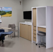 Treatment room with reclining chair and machines