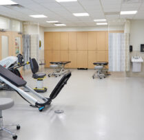 Physical therapy room with exercise equipment