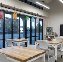 Smaller classroom with wood tabletops